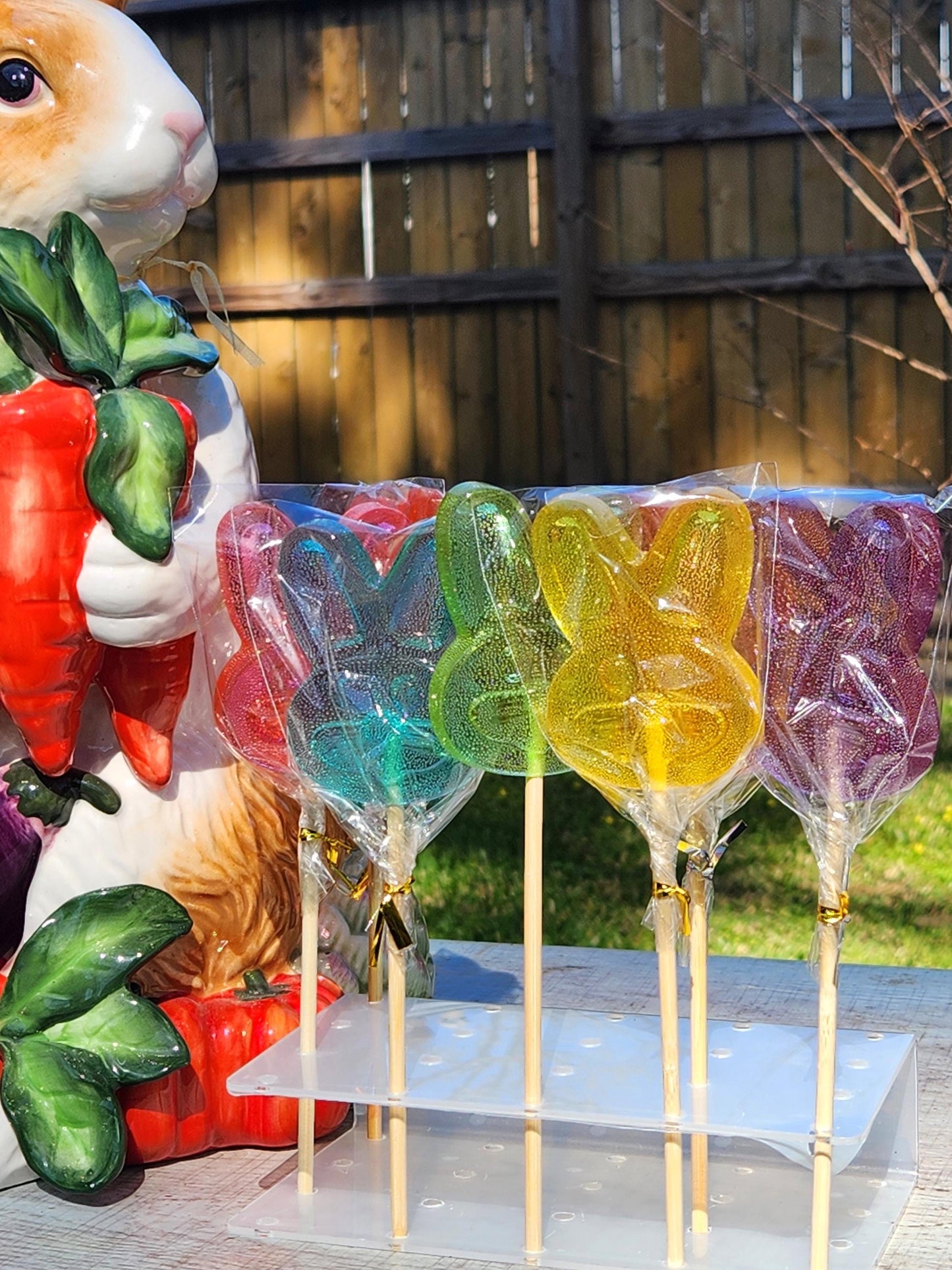Set of six rabbit lollipops in red, blue, green, yellow and purple candy